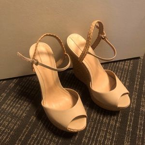 Tan wedge heels from Aldo. Good condition.